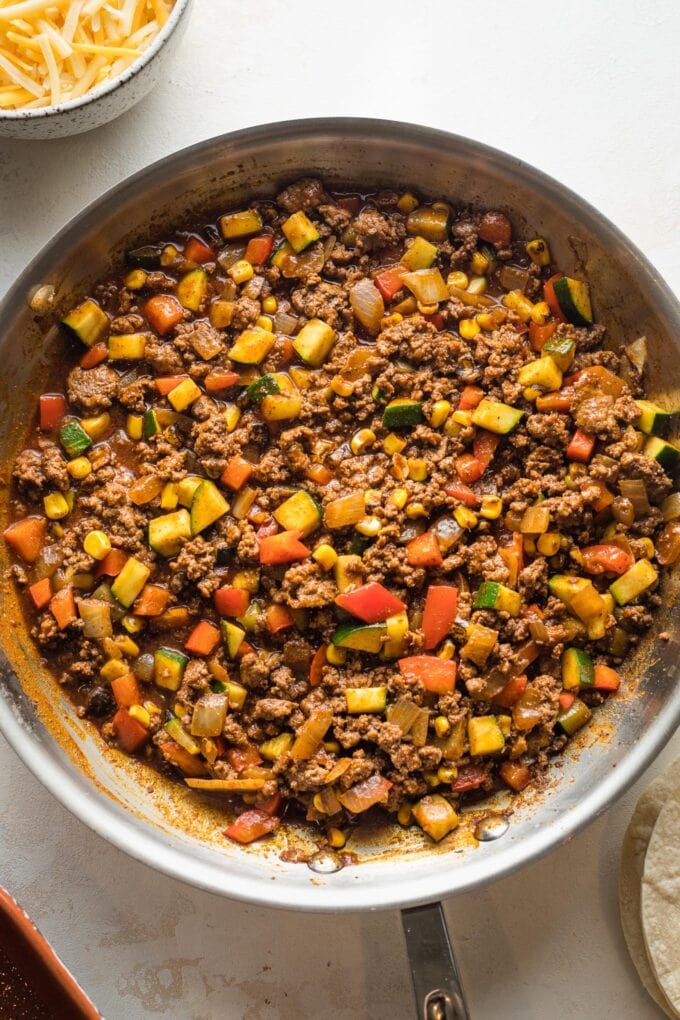 Enchilada filling in a skillet.