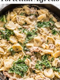 This recipe for Sausage Tortellini Alfredo is pure comfort food: creamy, delicious, and so easy to make. It's ready in about 30 minutes and has incredible flavor thanks to Italian sausage, tender cheese tortellini, and a smidge of fresh kale and lemon.