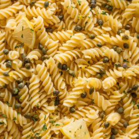 Rotini in a light lemon butter garlic sauce with capers and parsley.