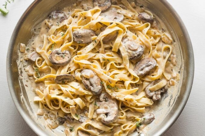 Skillet full of creamy mushroom stroganoff, ready to serve.