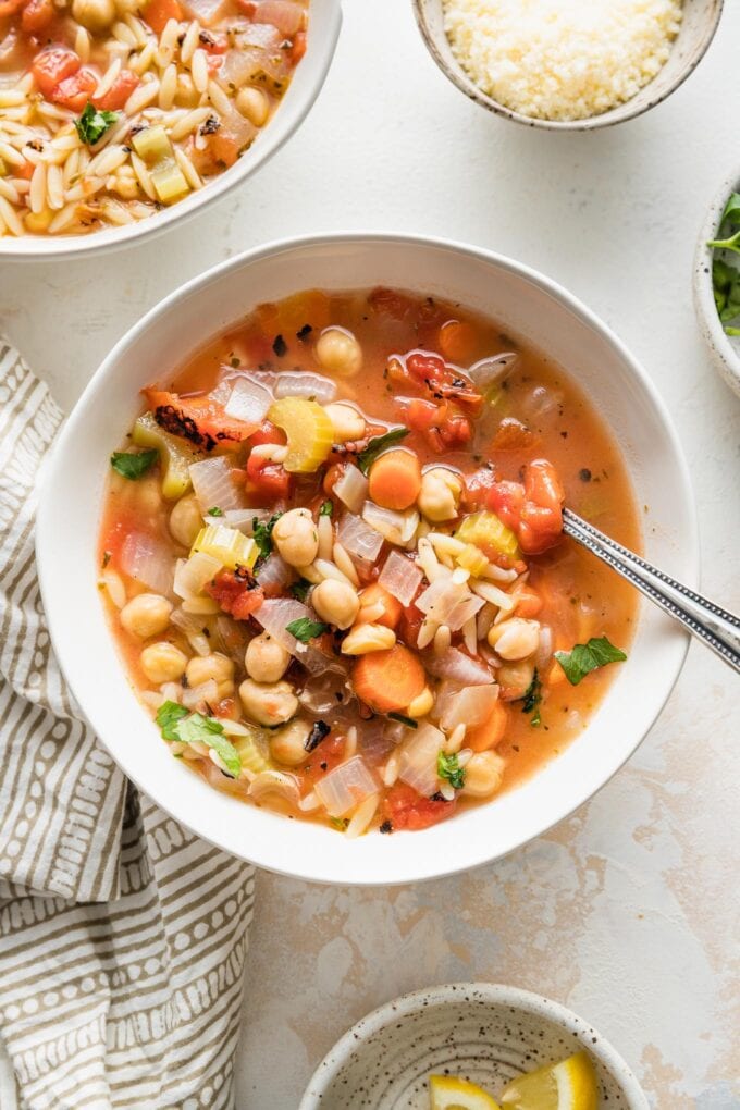 Serving bowl full of Italian chickpea soup, ready to eat.