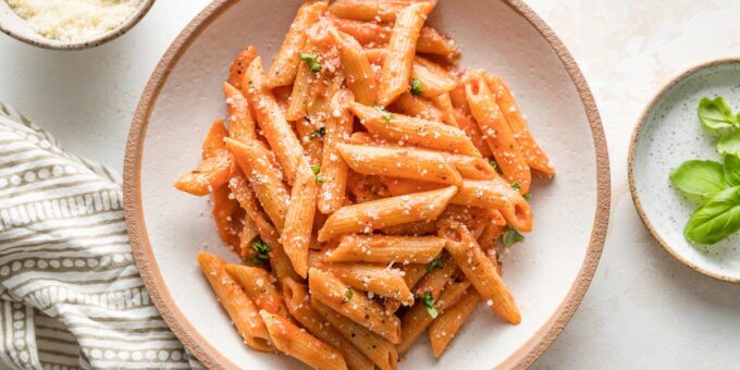 You'll love that this recipe for Creamy Tomato Pasta comes together fast with simple ingredients. Tender pasta gets coated in a silky tomato sauce that only tastes decadent, without requiring a ton of cream.