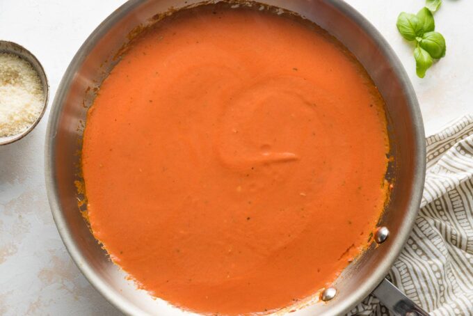 Homemade tomato cream sauce for pasta in a medium skillet.