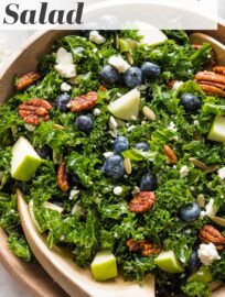 This Kale Blueberry Salad with crunchy pecans and creamy feta takes just minutes to throw together and makes us want to eat our weight in greens. With an easy homemade vinaigrette massaged in to soften the kale, this has all the flavor and texture you need for an any day, everyday salad.