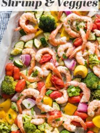 This easy recipe for Sheet Pan Shrimp and Veggies is flavorful and super quick. With tender garlic shrimp and a rainbow of oven-roasted veggies tossed in Italian herbs, this is a breezy dinner or meal prep you'll love to cook and to eat.