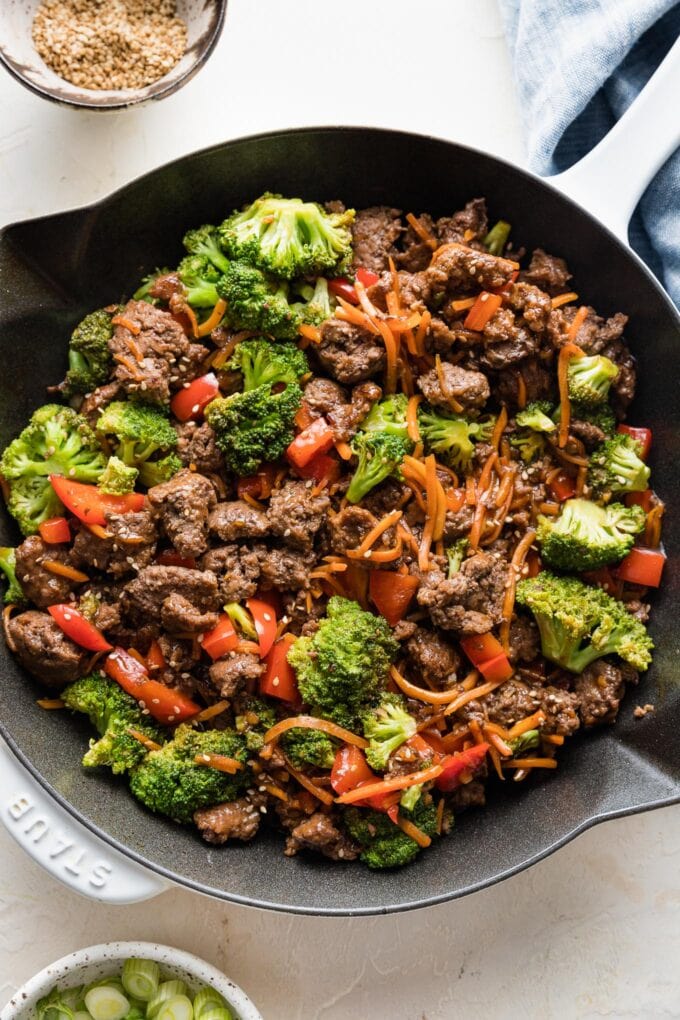 Close up of teriyaki ground beef in a cast iron skillet.