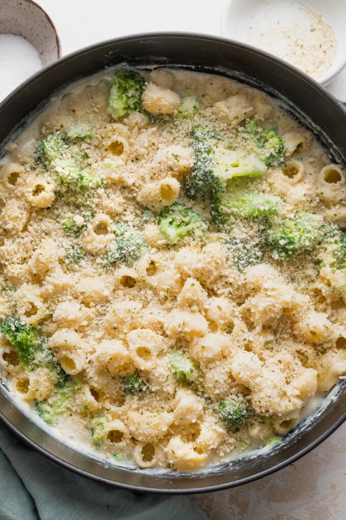 Breadcrumbs sprinkled on top of mac and cheese.
