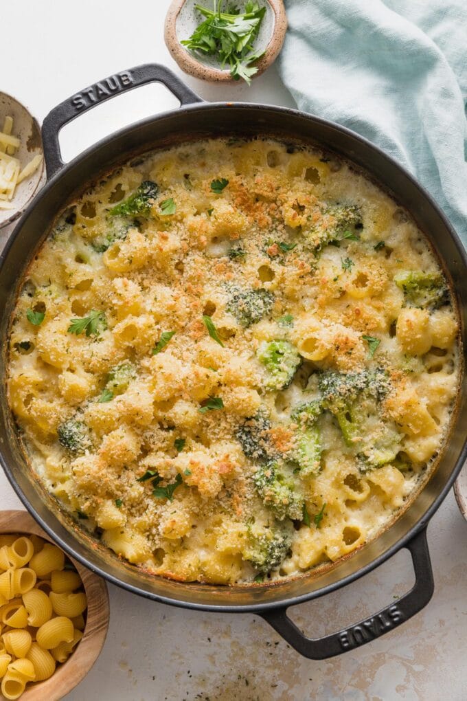 Just-baked broccoli mac and cheese removed from the oven with a crisp golden brown breadcrumb topping.