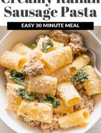 Creamy Italian sausage pasta is a deliciously easy family favorite! Tender pasta is tossed with savory crumbled sausage, a light cream sauce, wilted baby spinach, and generously grated Parmesan. Best of all, it's easy to make in about 25 minutes.