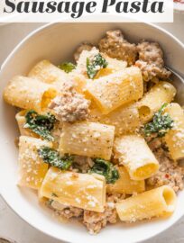 Creamy Italian sausage pasta is a deliciously easy family favorite! Tender pasta is tossed with savory crumbled sausage, a light cream sauce, wilted baby spinach, and generously grated Parmesan. Best of all, it's easy to make in about 25 minutes.