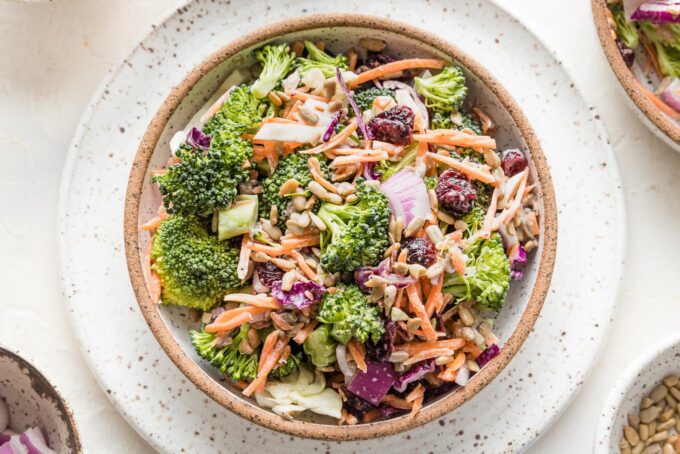 Small bowl filled with a serving of broccoli salad.