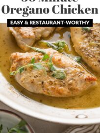 This fresh and delicious Oregano Chicken skillet is easy to make in just about 25 minutes. We love the tender pan-fried chicken breasts, white wine-infused sauce, and fresh sprigs of oregano. Simple yet restaurant-worthy!