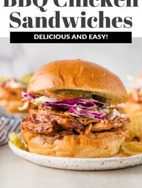 Sweet, tangy, and easy to make, these BBQ Chicken Sandwiches are a brilliant weeknight dinner or casual party meal. With tender slow-cooked chicken, flavorful BBQ sauce, and crisp cabbage slaw piled on toasted buns, this is a meal we enjoy again and again.