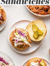 Sweet, tangy, and easy to make, these BBQ Chicken Sandwiches are a brilliant weeknight dinner or casual party meal. With tender slow-cooked chicken, flavorful BBQ sauce, and crisp cabbage slaw piled on toasted buns, this is a meal we enjoy again and again.