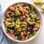 Small serving bowl full of black bean salsa.