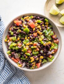 Small serving bowl full of black bean salsa.