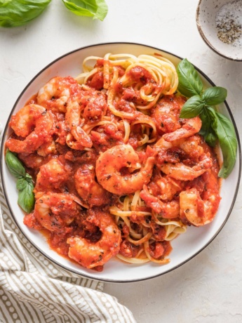 https://www.nourish-and-fete.com/wp-content/uploads/2023/07/shrimp-marinara-5-345x460.jpg