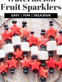 Watermelon Fruit Sparklers are fun, simple, and tasty, certain to delight kids and adults alike. They're the perfect easy snack or side for summer potlucks and BBQs, and especially fitting for Memorial Day or the Fourth of July.