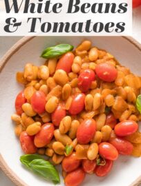 Braised White Beans with tomatoes and basil make a simple yet hearty and delicious weeknight dinner. We love to serve it in shallow bowls with garlic knots or sourdough toast and extra fresh herbs.