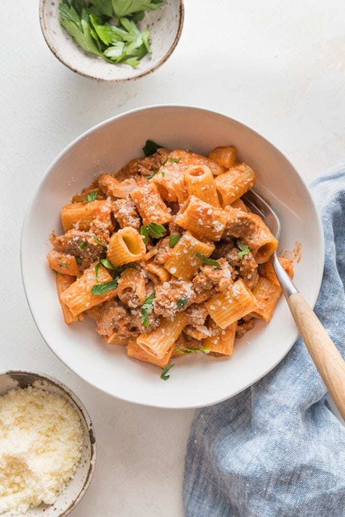 Small pasta bowl filled with a serving of ground beef pasta.