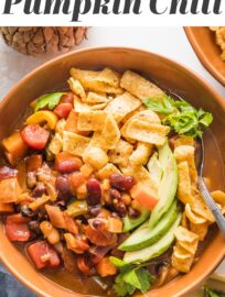 This easy Crockpot Pumpkin Chili is delicious and makes a perfect set-it-and-forget-it slow cooker meal. It's a vegetarian chili with a cozy mix of beans, pumpkin, bell peppers, sweet potato or butternut squash, and plenty of spices to ensure a flavorful bowl.