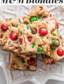 With a buttery brown sugar base and loads of cheerful red and green M&Ms, these Christmas Blondies are a surefire way to fast-track holiday cheer. They're soft, chewy, chocolate-packed, and best of all, easy to mix by hand in one bowl with minimal prep work.
