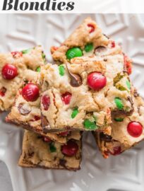 With a buttery brown sugar base and loads of cheerful red and green M&Ms, these Christmas Blondies are a surefire way to fast-track holiday cheer. They're soft, chewy, chocolate-packed, and best of all, easy to mix by hand in one bowl with minimal prep work.
