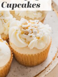 These super easy Champagne Cupcakes are made with a doctored cake mix, then filled and topped with champagne-infused buttercream. Grab this recipe when you need a treat that is super quick yet totally delicious and festive for New Year's, engagements, promotions, or any other big celebration!