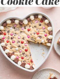 Bake and share this heart-shaped Valentine's Cookie Cake with someone you love for the sweetest treat! It's a giant chocolate chip cookie that you can decorate with frosting, sprinkles, M&Ms, or any other candies your heart desires.