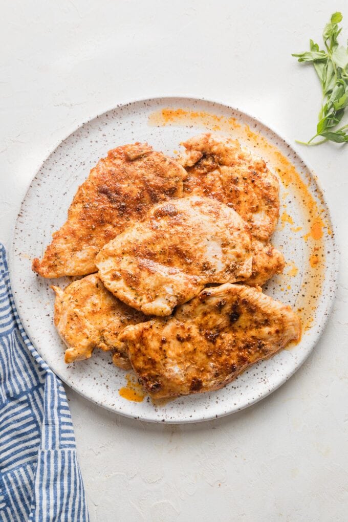 Pan-fried Cajun chicken breasts.