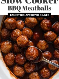 Crockpot BBQ Meatballs use just 3 ingredients and less than 5 minutes prep, yet are the ultimate party appetizer or ultra-easy dinner served over egg noodles or mashed potatoes. A few short hours in the slow cooker delivers tender, juicy meatballs coated in a sticky, sweet BBQ glaze.