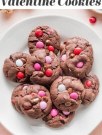 Thick, chewy double chocolate cookies with slightly crisp edges and extra large scoops of chocolate chips plus pink and red M&Ms. These make the ultimate Valentine cookies for sharing with anyone you adore!