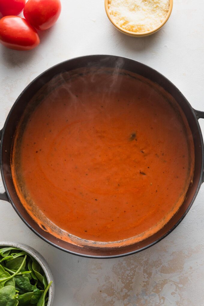 Creamy tomato sauce in a deep skillet.