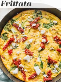 Whip up this Mediterranean Frittata for a quick, delicious, and satisfying meal any time of the day. It's got fluffy eggs, tender greens, tangy sun-dried tomatoes, and creamy Feta cheese, all in an easy one-skillet dish you'll love time and again.