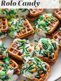 Super cute, super festive, and super easy, this Rolo Pretzel Candy is all dressed up for a simple St. Patrick's Day treat. These are so simple and fun to make for or with your kids!