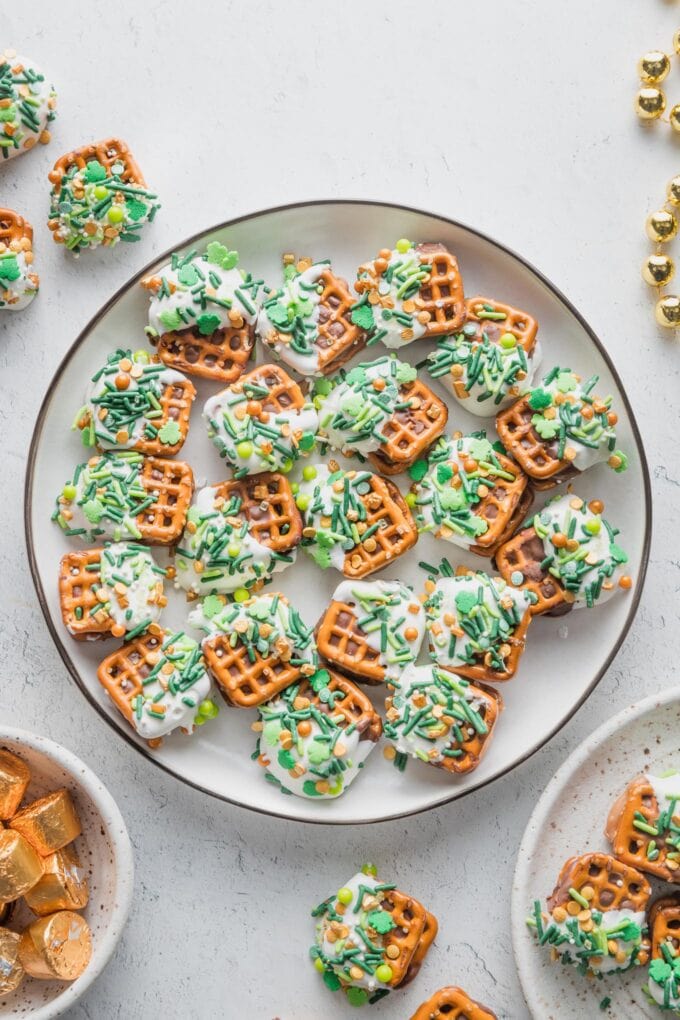 Counter filled with St. Patrick's Day themed Rolo pretzel candies.