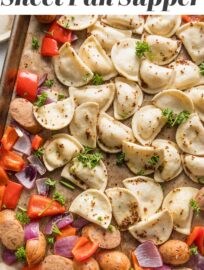 Tender Mini Pierogies mingle with a deliciously flavorful sauce, vibrant onion and pepper, and crisp chicken sausage for a 30 minute sheet pan meal that's almost completely hands-off. This is a life-saver for crazy busy nights when you just need dinner done fast!