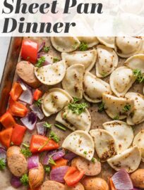 Tender Mini Pierogies mingle with a deliciously flavorful sauce, vibrant onion and pepper, and crisp chicken sausage for a 30 minute sheet pan meal that's almost completely hands-off. This is a life-saver for crazy busy nights when you just need dinner done fast!