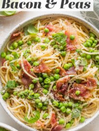 This recipe for Pasta with Bacon and Peas is so simple, but don't be fooled: the addition of an easy emulsified sauce makes these homey ingredients punch way above their weight. This is 20 minute dinner perfection, tailor made for those nights when you just don't know what else to make.