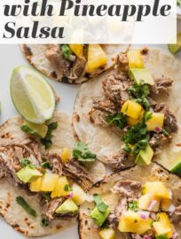 These Instant Pot Carnitas tacos are a meal to remember, packed with flavor and the most delightful mix of textures, from the tender, crispy-edged pork to the creamy avocado and fresh pineapple salsa. Make extra: the carnitas reheat beautifully for burrito bowls and salads all week long.
