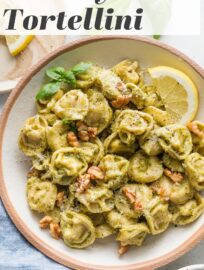 This simple and deliciously Creamy Pesto Tortellini is a dish you can toss together in just about 20 minutes yet feel great serving your family. It has a short list of ingredients and is a no-brainer to make, placing it forever among my favorite back-pocket recipes for busy weeknights.