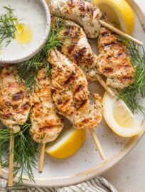 Greek Chicken Skewers are super easy to make but pack a double punch of major Mediterranean flavors and tender, juicy chicken, all thanks to a no-fail yogurt-based marinade. Pop these on the grill -- or the grill pan to make indoors -- and get excited for a deliciously simple yet elevated meal.