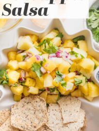 This fresh Pineapple Salsa is the perfect blend of sweet and spicy, with juicy pineapple bits, cilantro, red onion, jalapeño, and a pinch of salt and citrus for zest. A delicious and unexpected appetizer, it also makes a super topping for your next taco or burrito bowl night. Especially good with pork or shrimp!