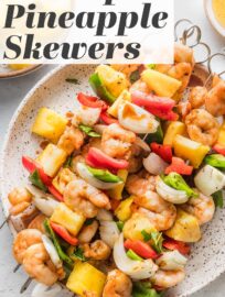 These Shrimp Pineapple Skewers are a straight shot of summer: vibrant, easy to make, and bursting with flavor from a silky honey garlic marinade. Toss these on the grill and serve over rice or a big salad for an easy, breezy al fresco meal.