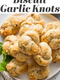 Biscuit Garlic Knots are unbelievably easy to make, but consider yourself warned: with tender, buttery biscuit dough and the most irresistible garlic Parmesan seasoning, you may find you want to eat the entire batch. No yeast, no rising, fully done in about 25 minutes. Semi-homemade never tasted so good.