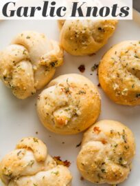 Biscuit Garlic Knots are unbelievably easy to make, but consider yourself warned: with tender, buttery biscuit dough and the most irresistible garlic Parmesan seasoning, you may find you want to eat the entire batch. No yeast, no rising, fully done in about 25 minutes. Semi-homemade never tasted so good.