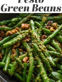 Vibrant and flavorful, Pesto Green Beans are the ultimate side dish: a little elegant, still easy to make, and utterly delicious. Herbaceous pesto, a little lemon zest, and earthy toasted walnuts are the best way to take simple green beans up a notch.