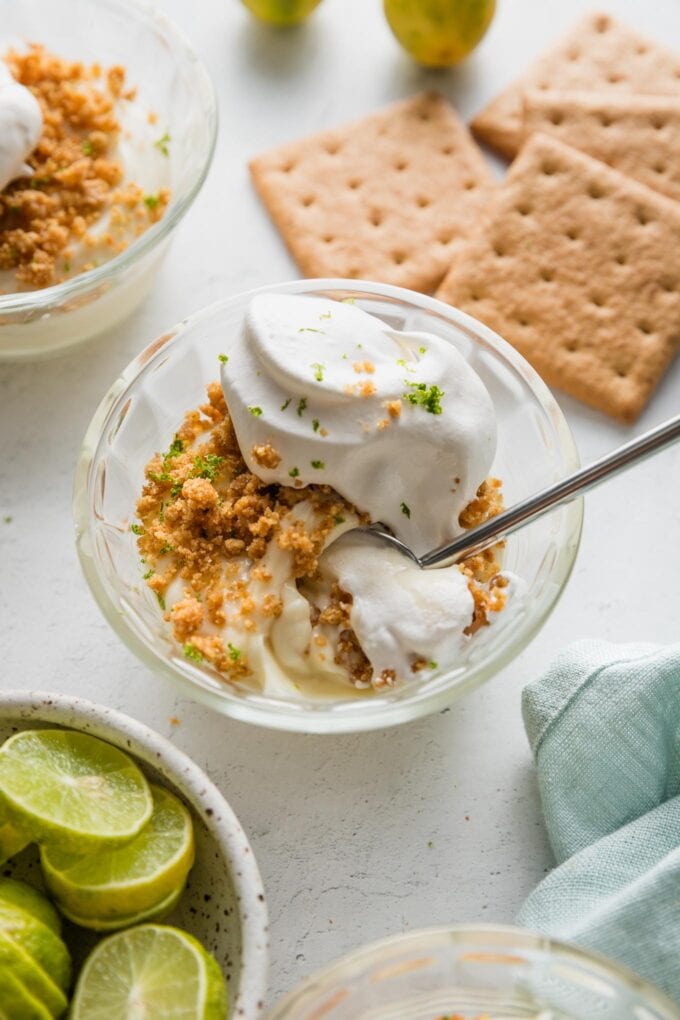 Close up of a spoonful of no bake key lime pie.