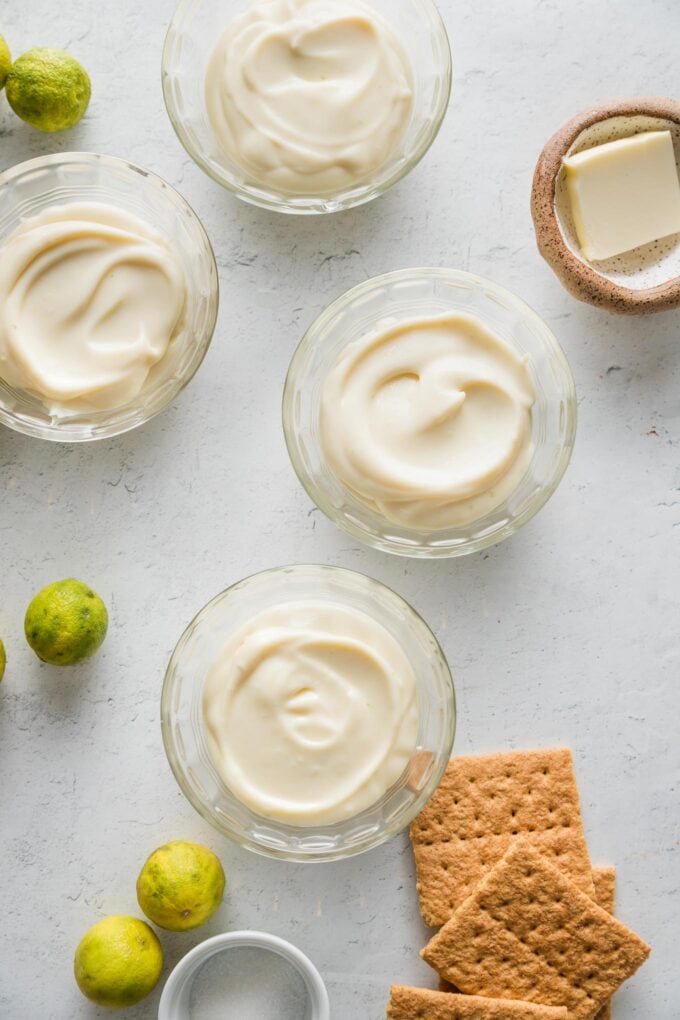 Small custard dishes filled with a no bake key lime pie filling.