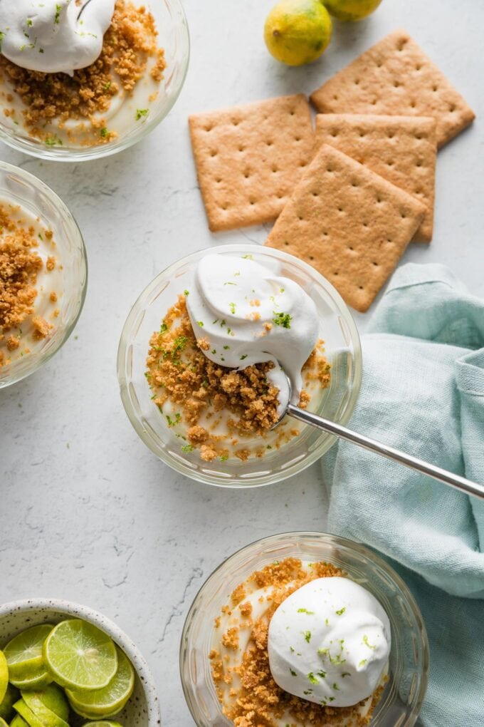 Countertop set with individual no bake key lime pies, extra graham crackers, and key limes.
